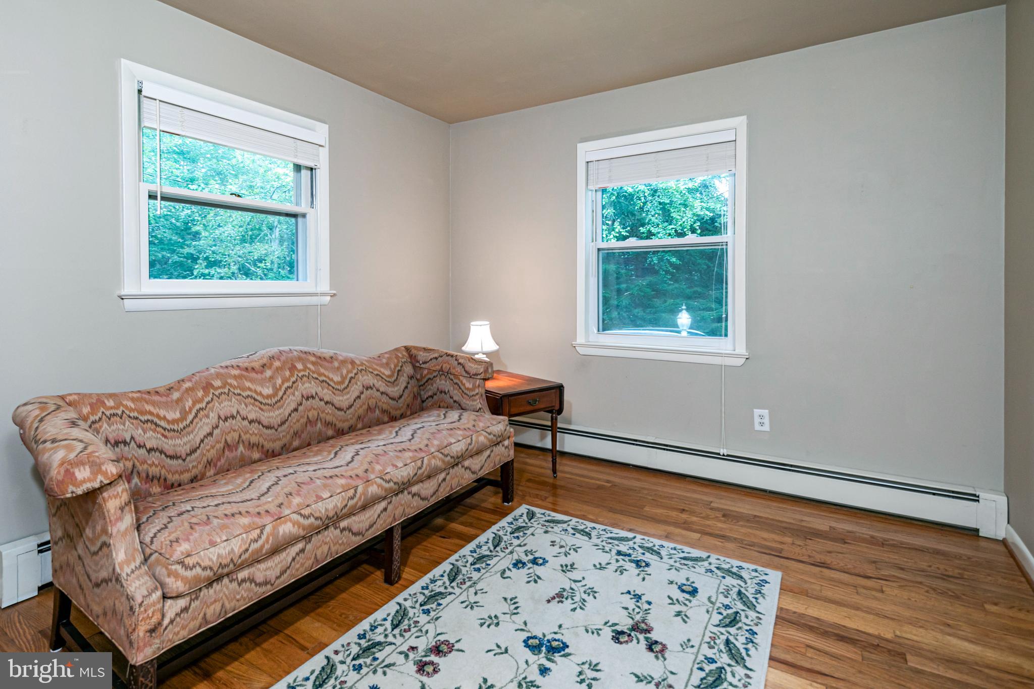 63 North Mill Road Princeton Junction, NJ 08550 - Photo 13 of 29 a bed sitting in a bedroom next to a window