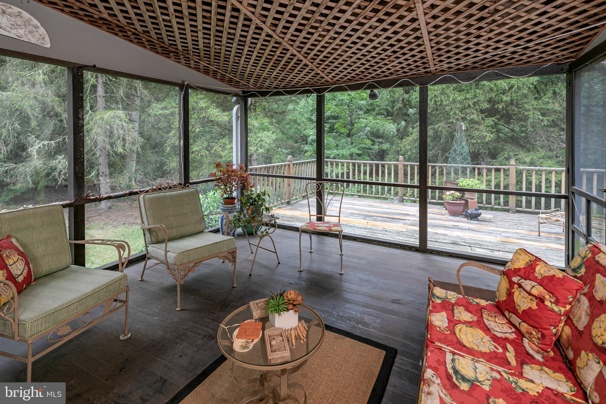 63 North Mill Road Princeton Junction, NJ 08550 - Photo 20 of 29 a living room with furniture and a floor to ceiling window