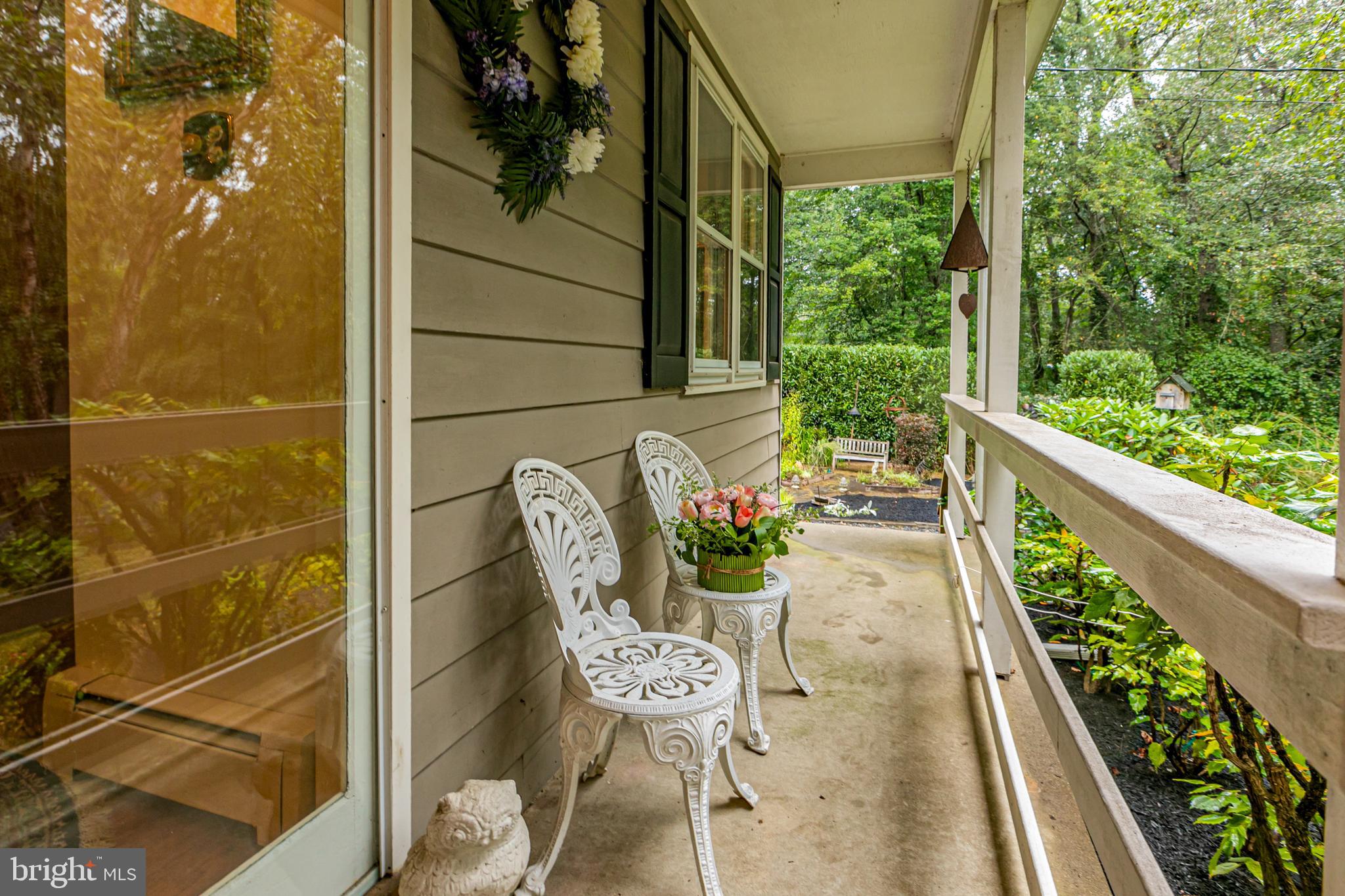 63 North Mill Road Princeton Junction, NJ 08550 - Photo 3 of 29 a view of a chairs and table in the balcony