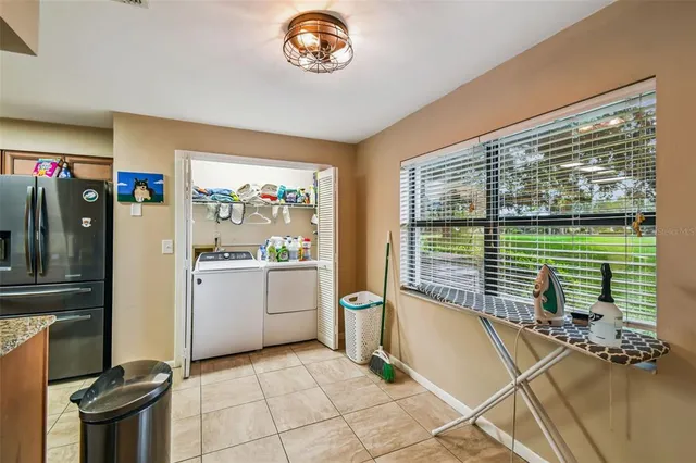 a room with window and a bath tub