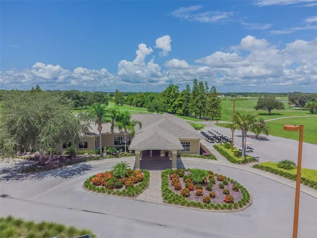 an aerial view of a house with a garden