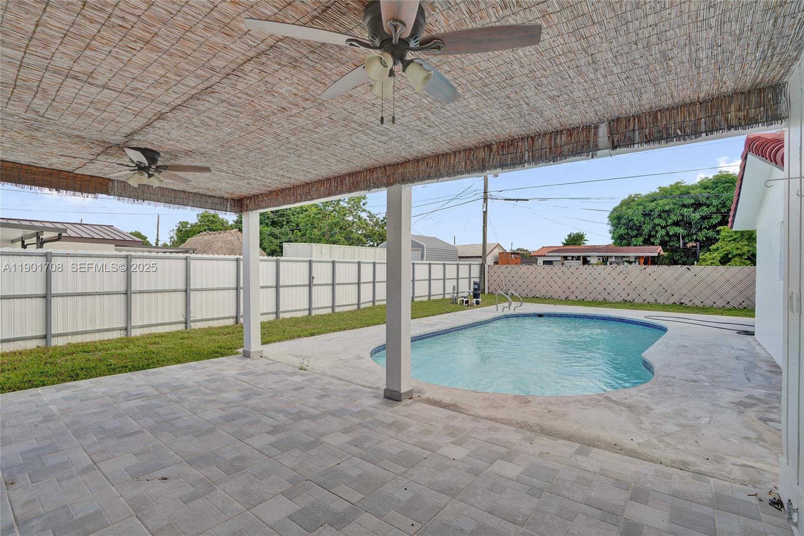 5750 Northwest 111th Street Hialeah, FL 33012 - Photo 12 of 34 a view of a backyard