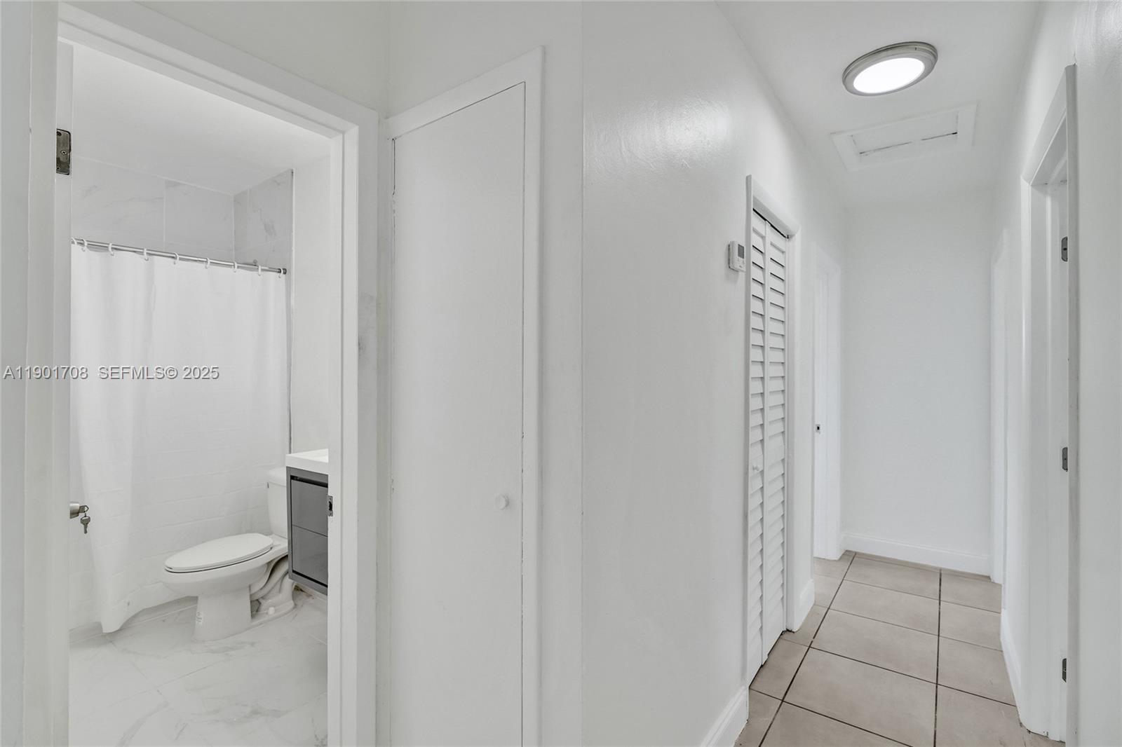 5750 Northwest 111th Street Hialeah, FL 33012 - Photo 19 of 34 a bathroom with a toilet