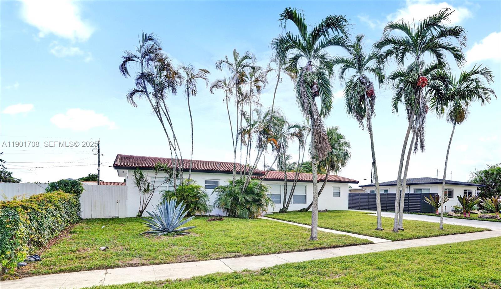 5750 Northwest 111th Street Hialeah, FL 33012 - Photo 30 of 34 a view of a park with palm trees
