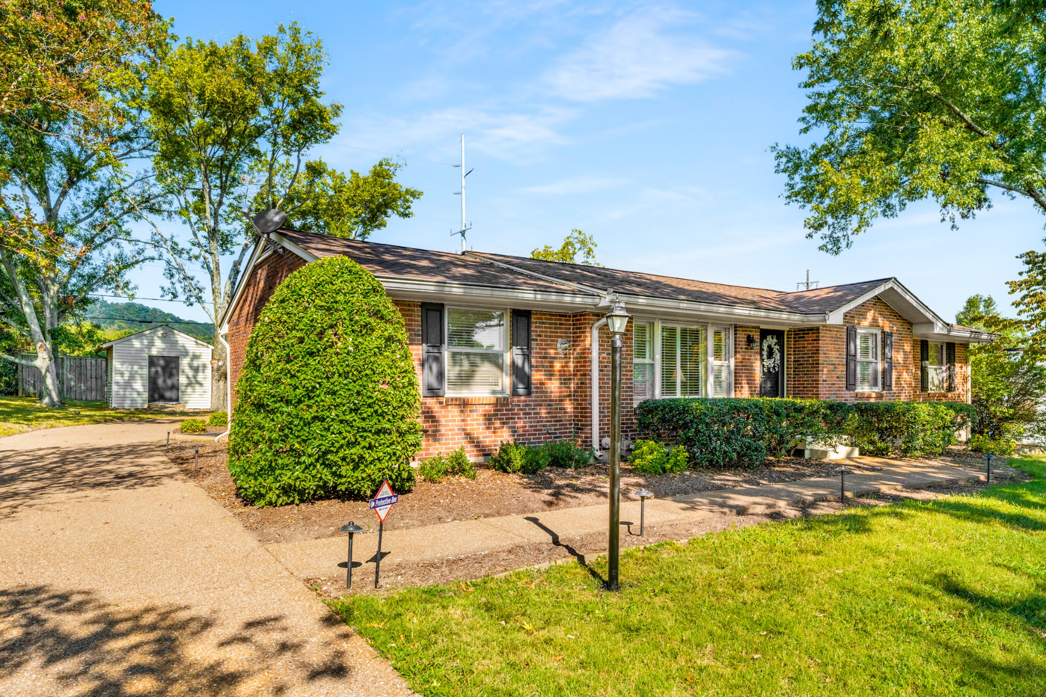 5123 Regent Drive Nashville, TN 37220 - Photo 2 of 29 a view of a house with a swimming pool