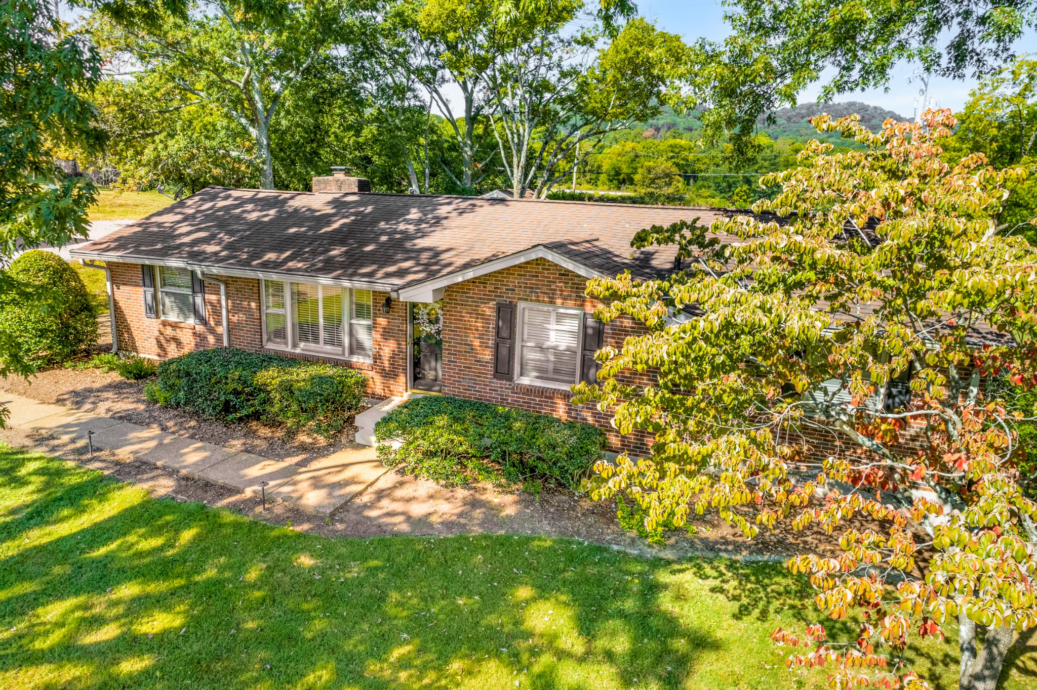 5123 Regent Drive Nashville, TN 37220 - Photo 4 of 29 a view of house with yard and trees in the background