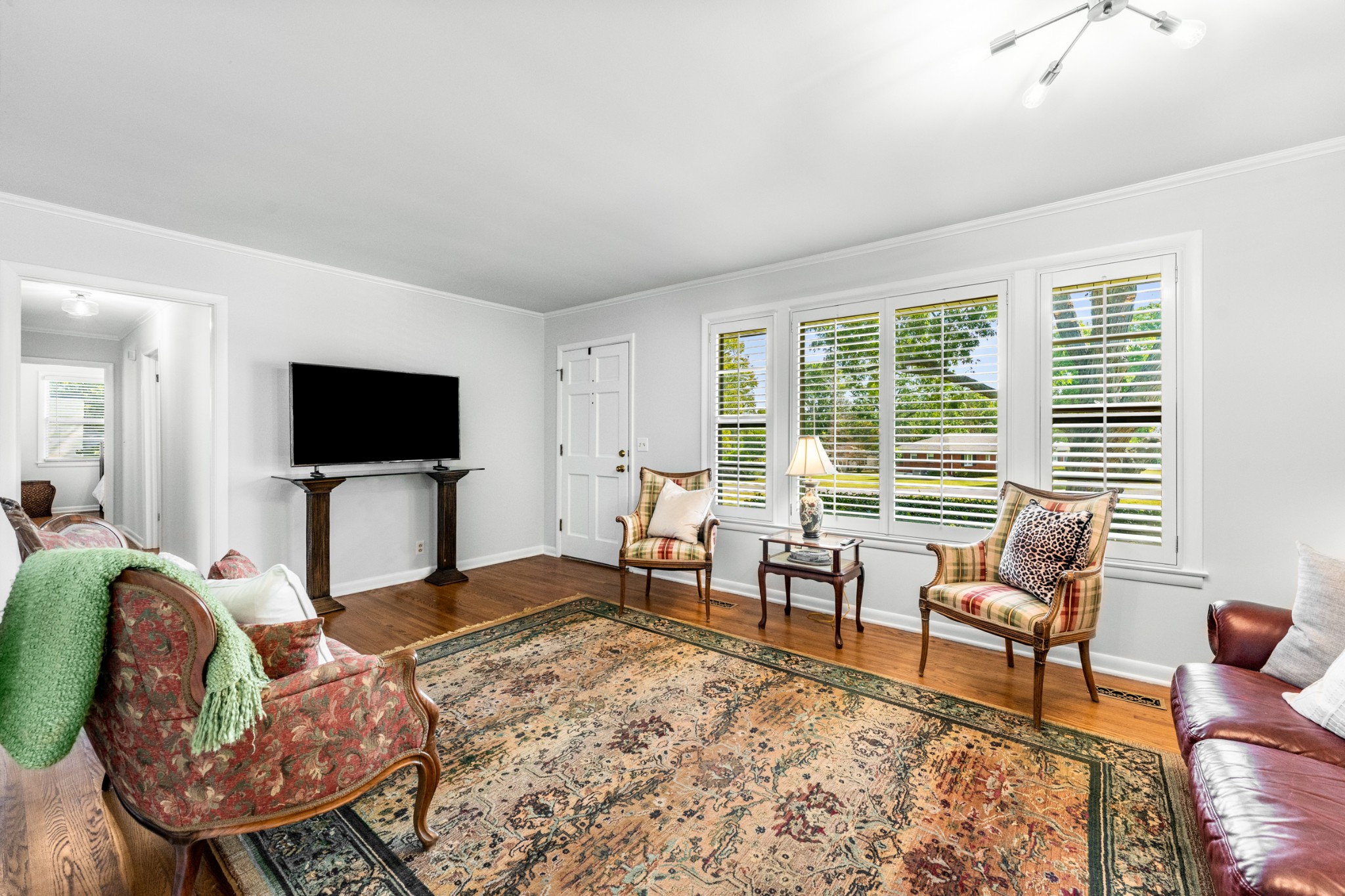 5123 Regent Drive Nashville, TN 37220 - Photo 8 of 29 a living room with furniture and a flat screen tv