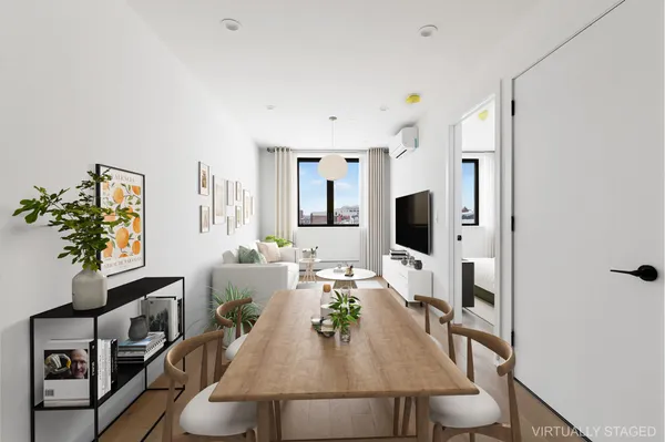 a view of a dining room with furniture