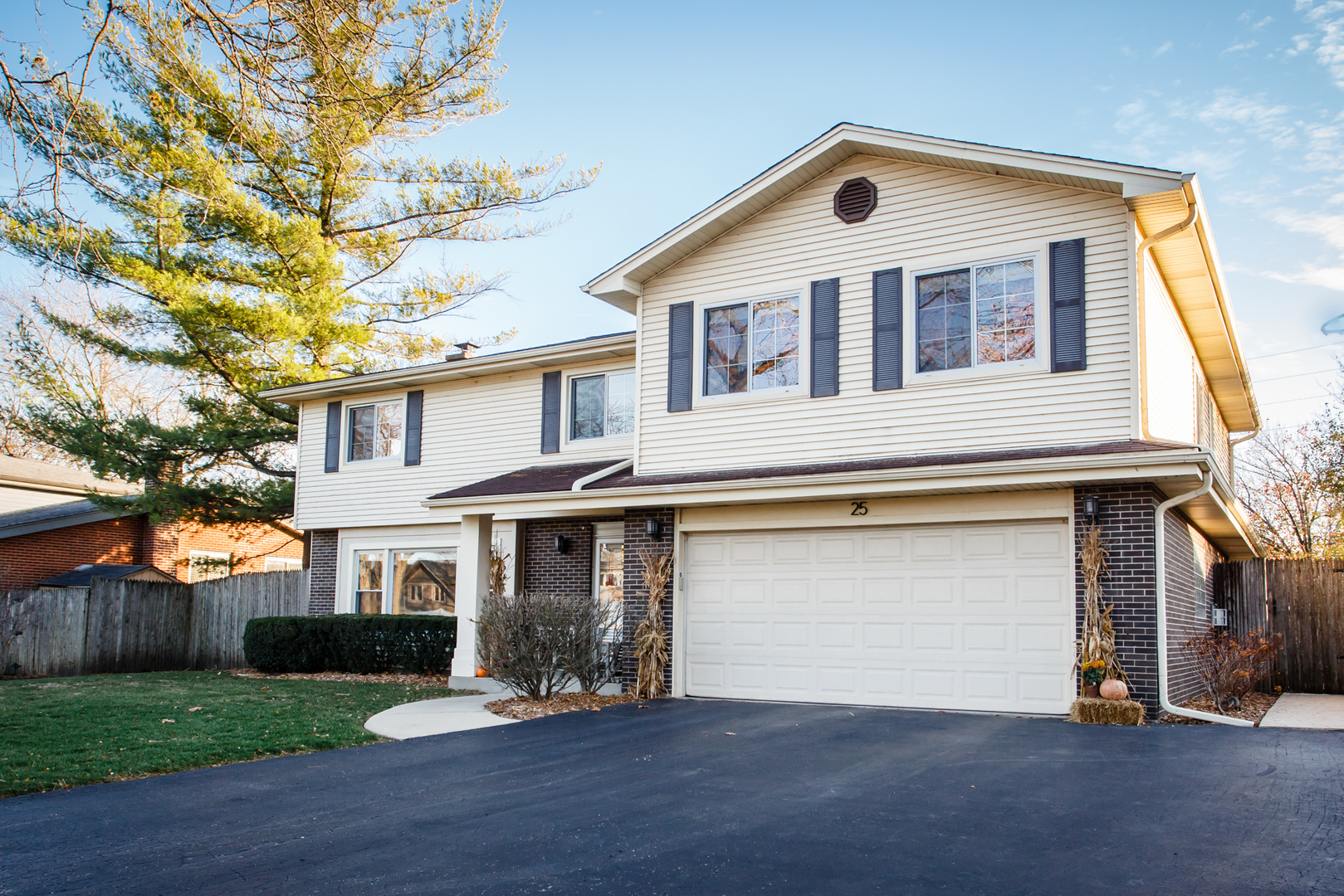 25 Mulberry Road Deerfield, IL 60015 - Photo 2 of 63 a front view of a house with a yard and garage