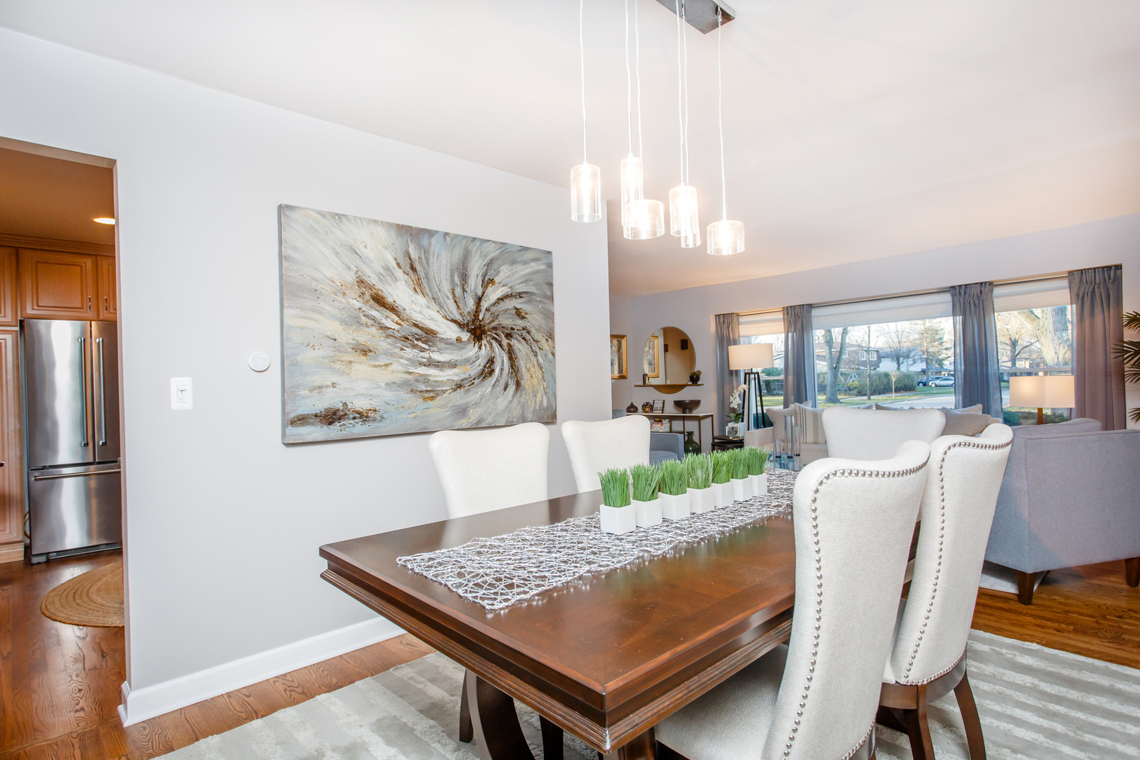 25 Mulberry Road Deerfield, IL 60015 - Photo 12 of 63 a view of a dining room with furniture window and wooden floor