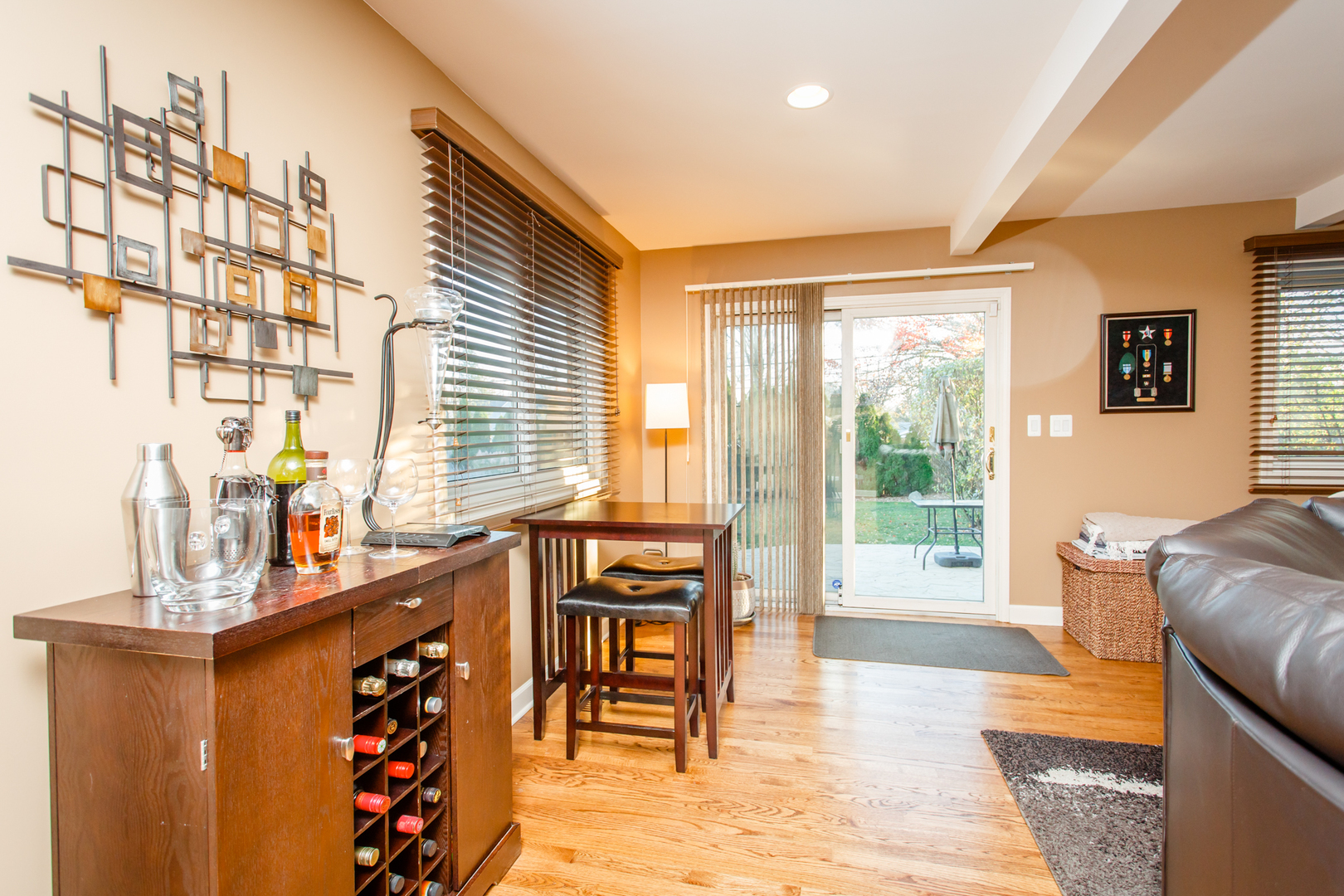 25 Mulberry Road Deerfield, IL 60015 - Photo 21 of 63 a living room with furniture and a floor to ceiling window