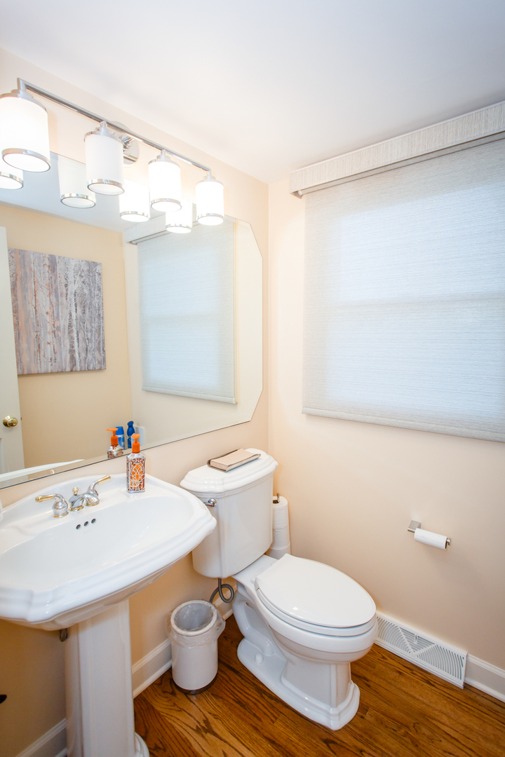25 Mulberry Road Deerfield, IL 60015 - Photo 27 of 63 a bathroom with a sink toilet and shower
