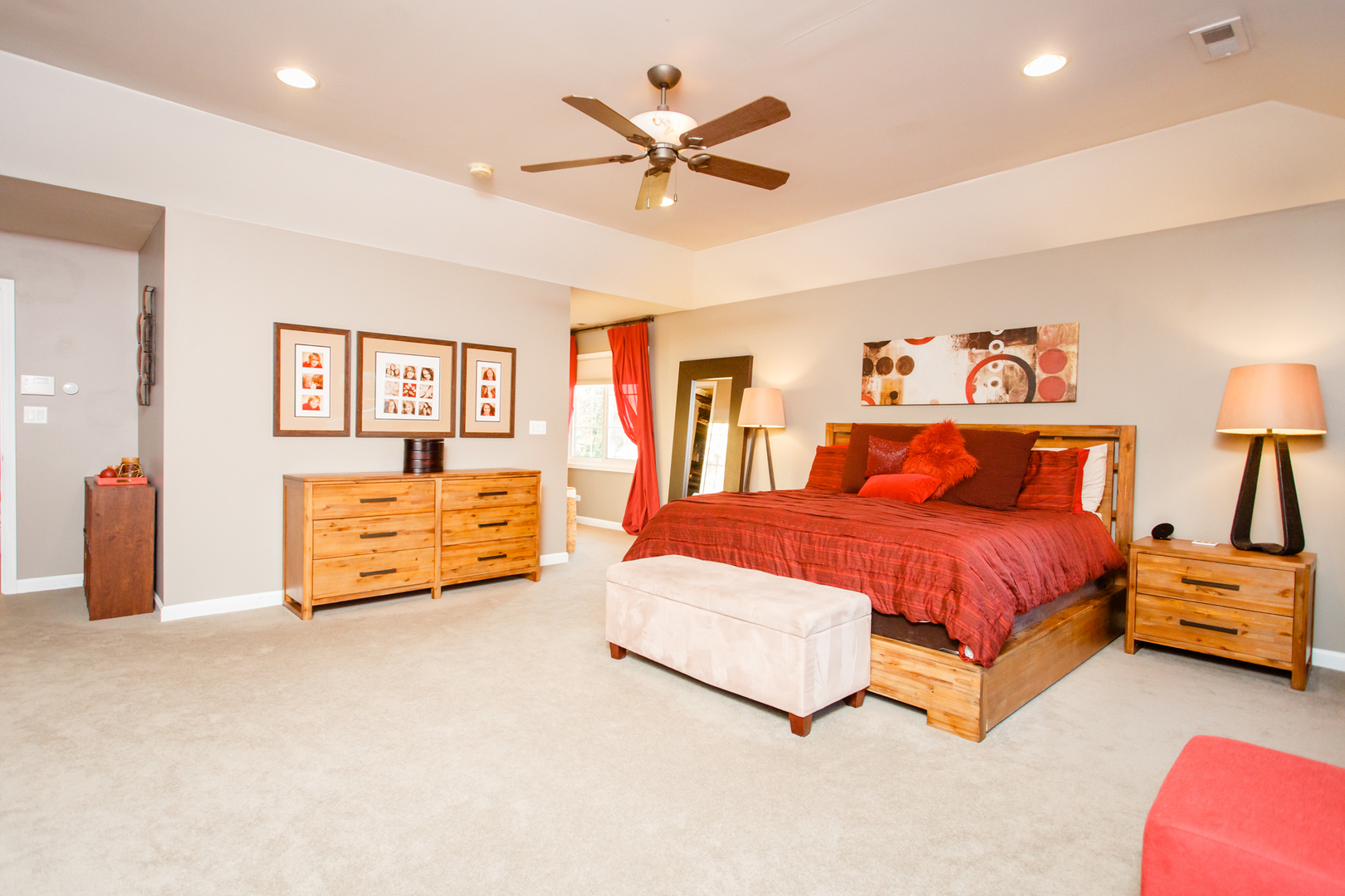 25 Mulberry Road Deerfield, IL 60015 - Photo 31 of 63 a spacious bedroom with a bed and a chandelier