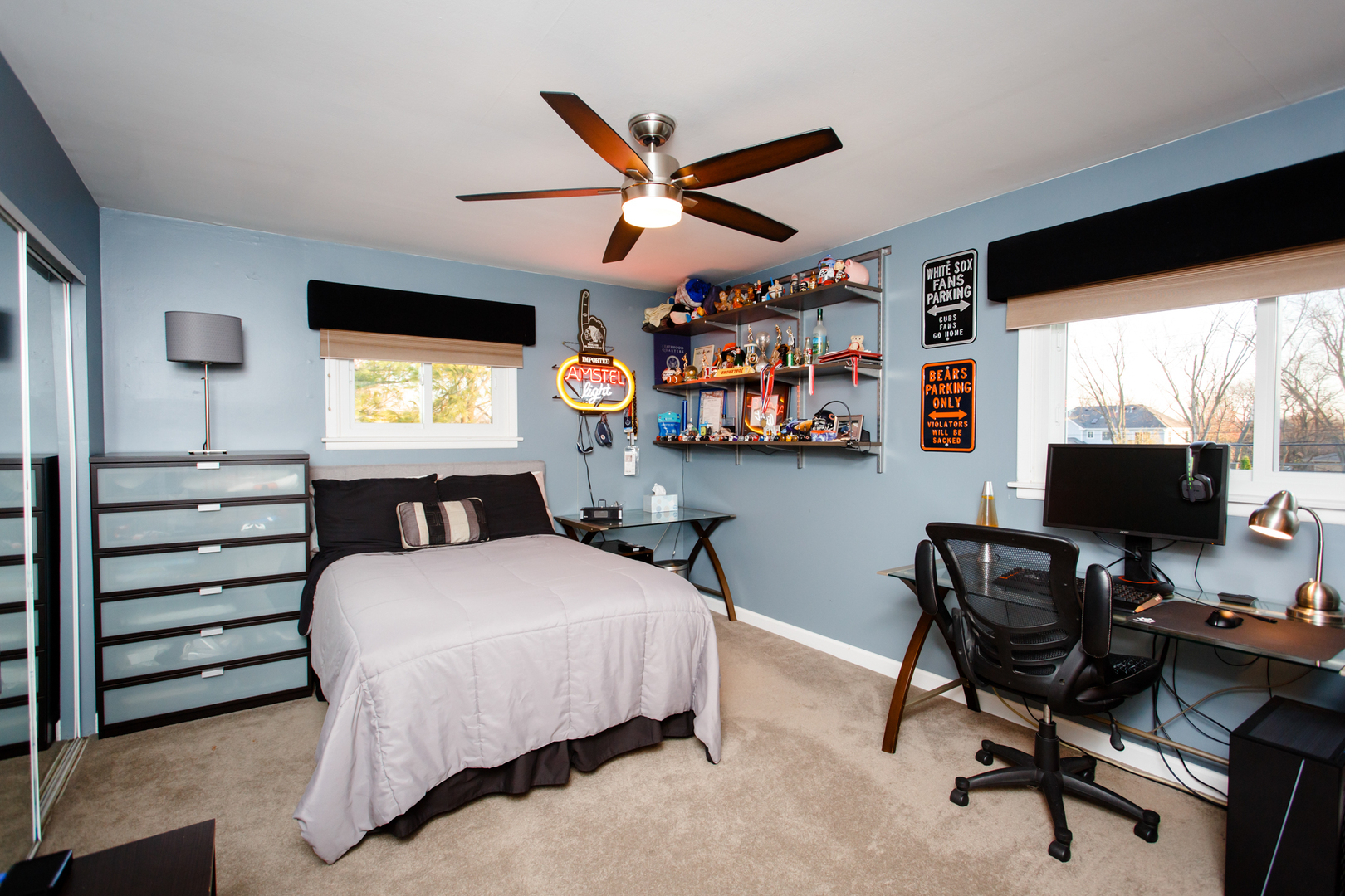 25 Mulberry Road Deerfield, IL 60015 - Photo 39 of 63 a bedroom with a bed and a flat screen tv