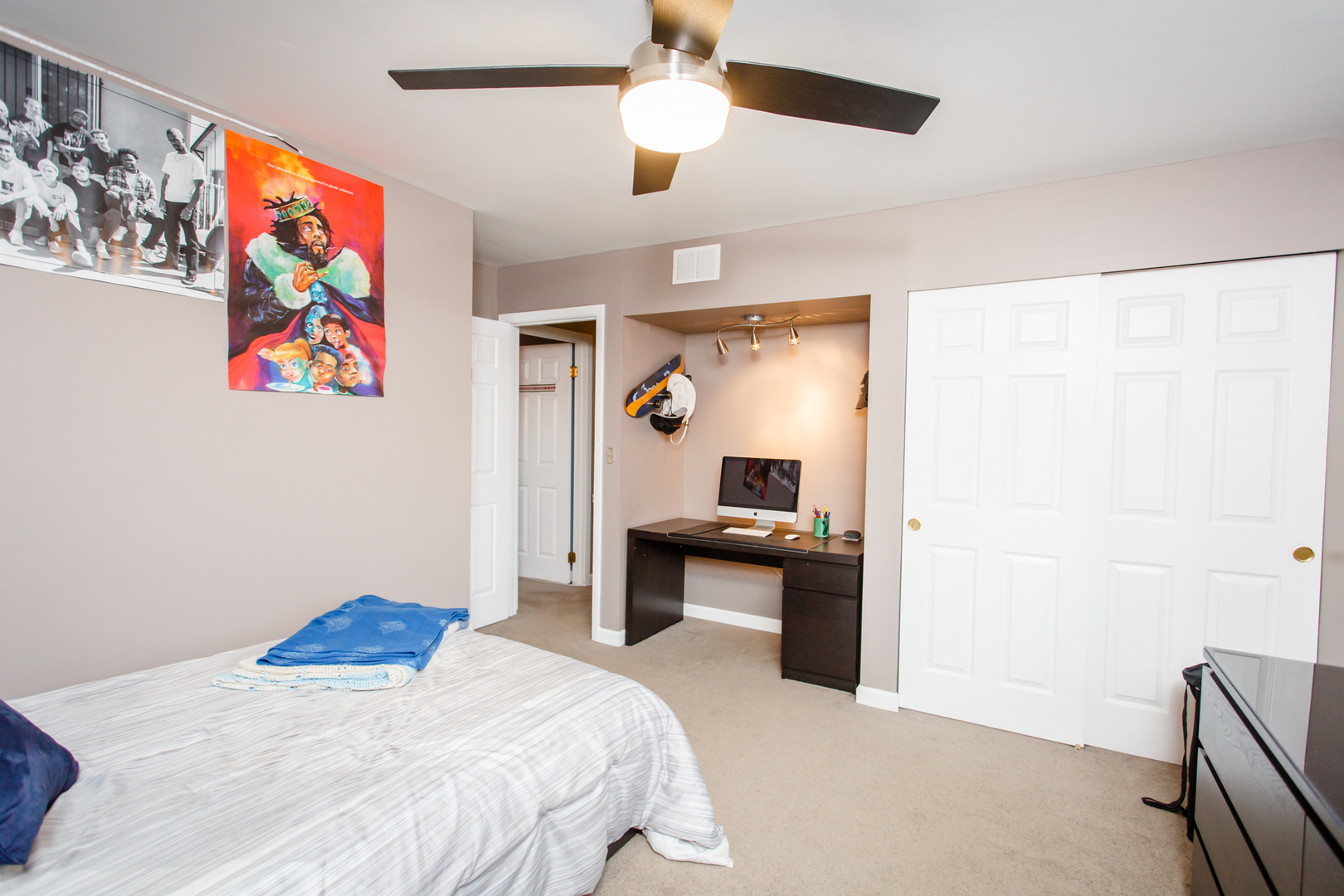 25 Mulberry Road Deerfield, IL 60015 - Photo 44 of 63 a bedroom with a bed and a chandelier