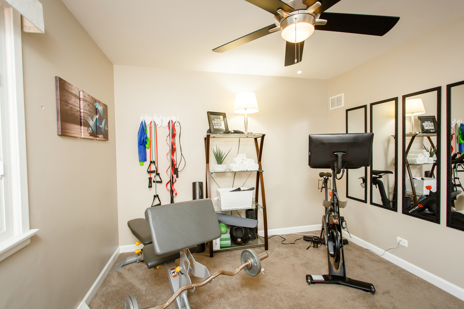 25 Mulberry Road Deerfield, IL 60015 - Photo 46 of 63 a view of a workspace with furniture and a ceiling fan