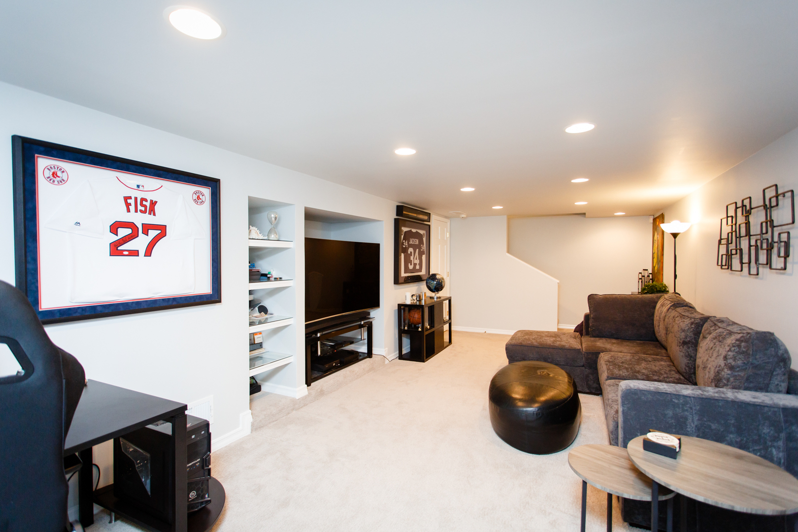 25 Mulberry Road Deerfield, IL 60015 - Photo 50 of 63 a living room with furniture and a flat screen tv