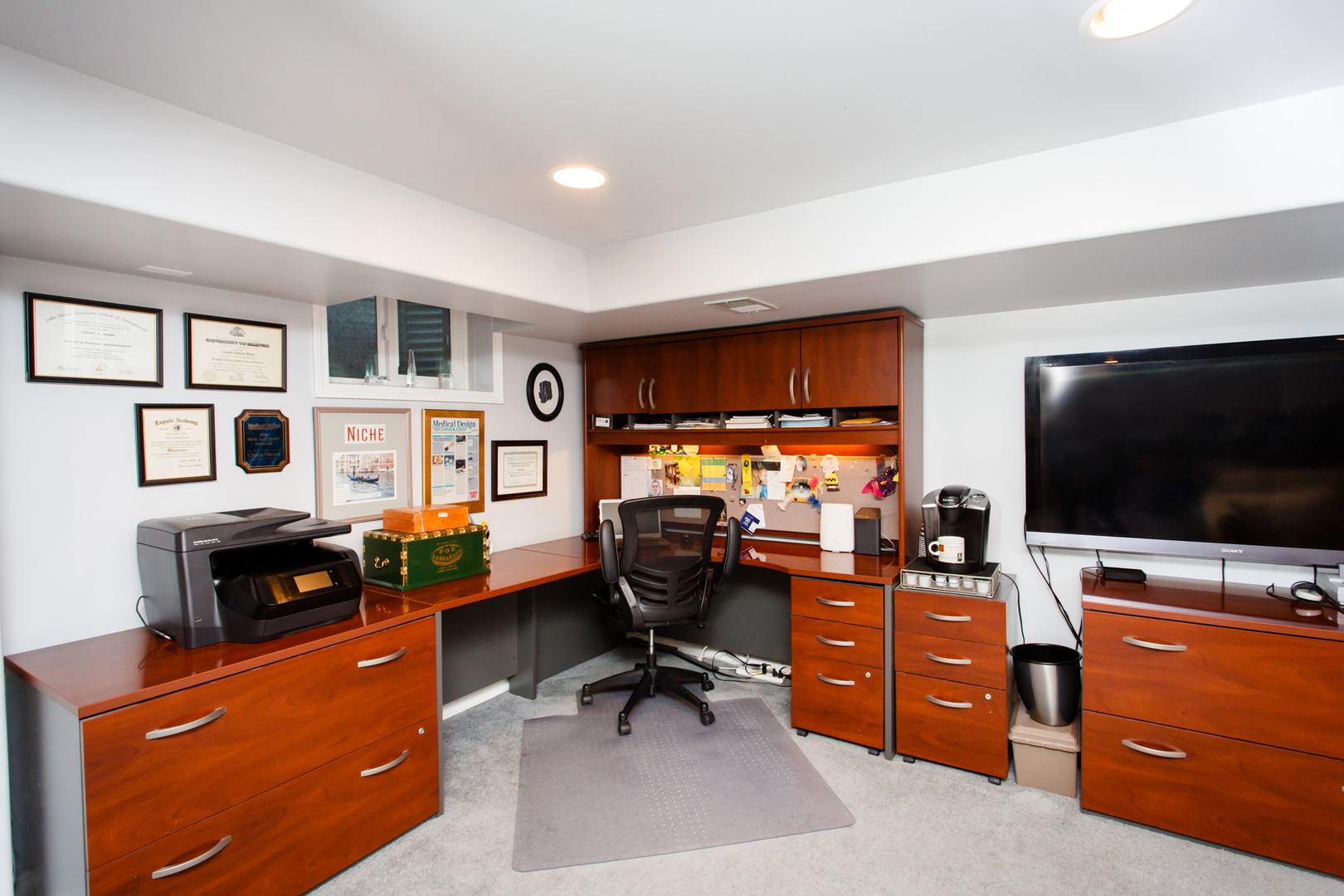 25 Mulberry Road Deerfield, IL 60015 - Photo 52 of 63 a view of a livingroom with workspace and a couch