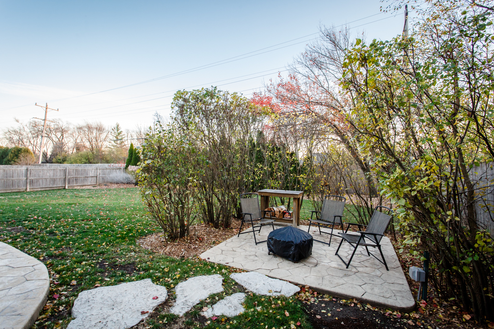 25 Mulberry Road Deerfield, IL 60015 - Photo 54 of 63 a view of a chairs and table in the back yard