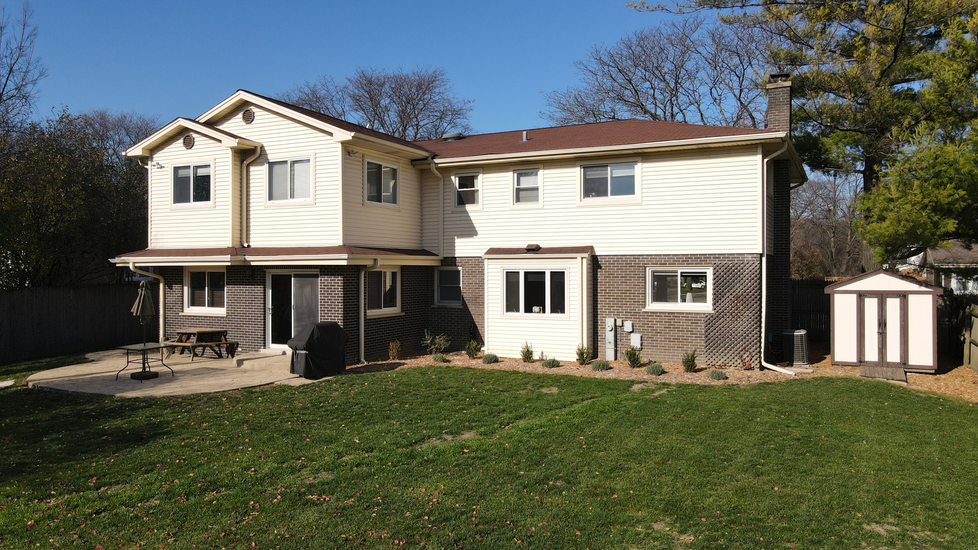 25 Mulberry Road Deerfield, IL 60015 - Photo 63 of 63 a front view of a house with a yard