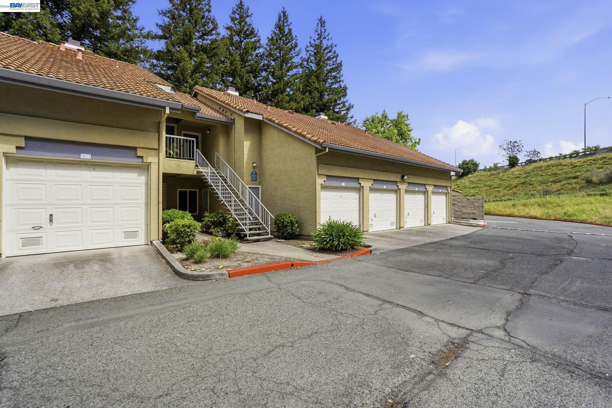 1405 Forest Run Hercules, CA 94547 - Photo 1 of 26 a front view of a house with porch