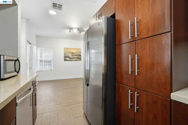 a bathroom with a shower and a sink