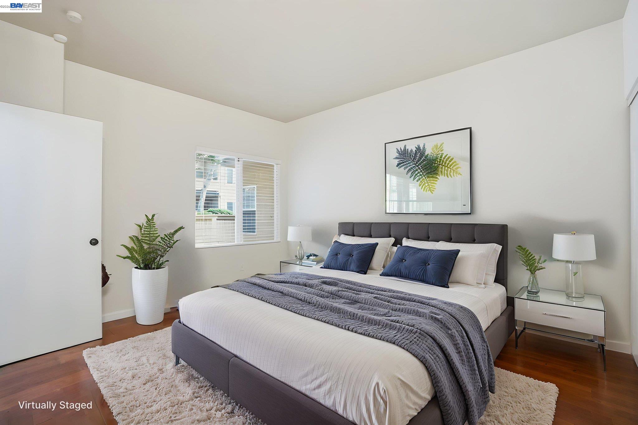 1405 Forest Run Hercules, CA 94547 - Photo 15 of 26 a bedroom with a balcony a bed and a painting on the wall