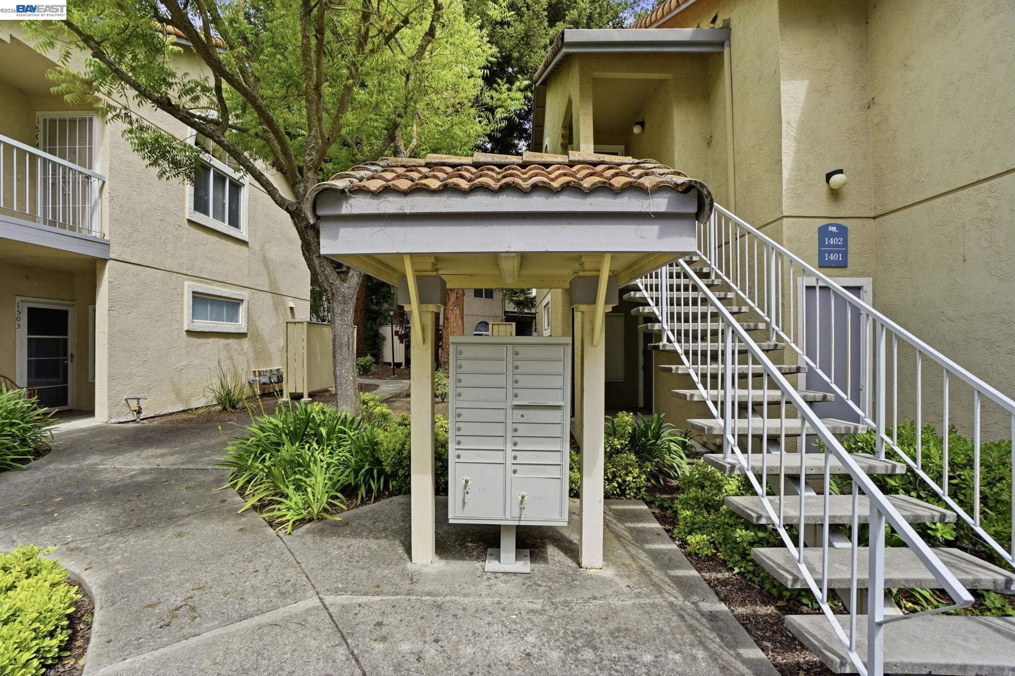 1405 Forest Run Hercules, CA 94547 - Photo 4 of 26 a front view of a house with a garden