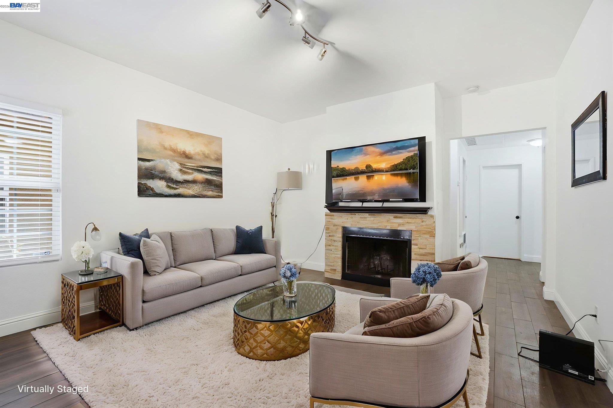 1405 Forest Run Hercules, CA 94547 - Photo 9 of 26 a living room with furniture a fireplace and a flat screen tv