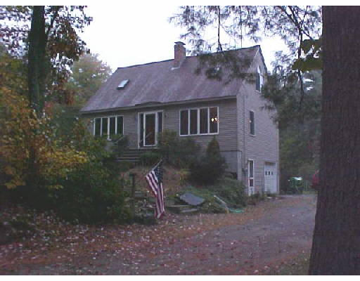 348 Simonds Road Ashby, MA 01431 - Photo 1 of 1 a view of a house with a yard