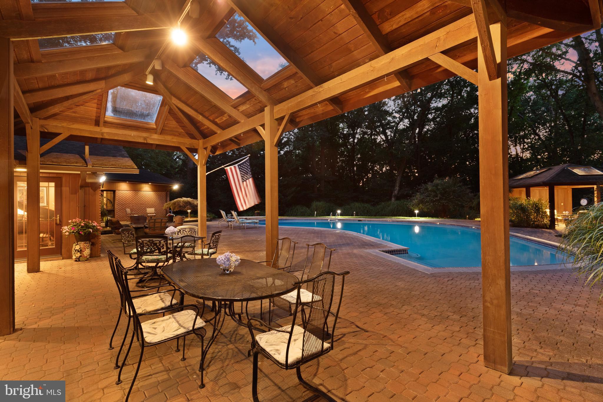 10810 Baronet Road Owings Mills, MD 21117 - Photo 15 of 83 a view of patio with table and chairs and potted plants