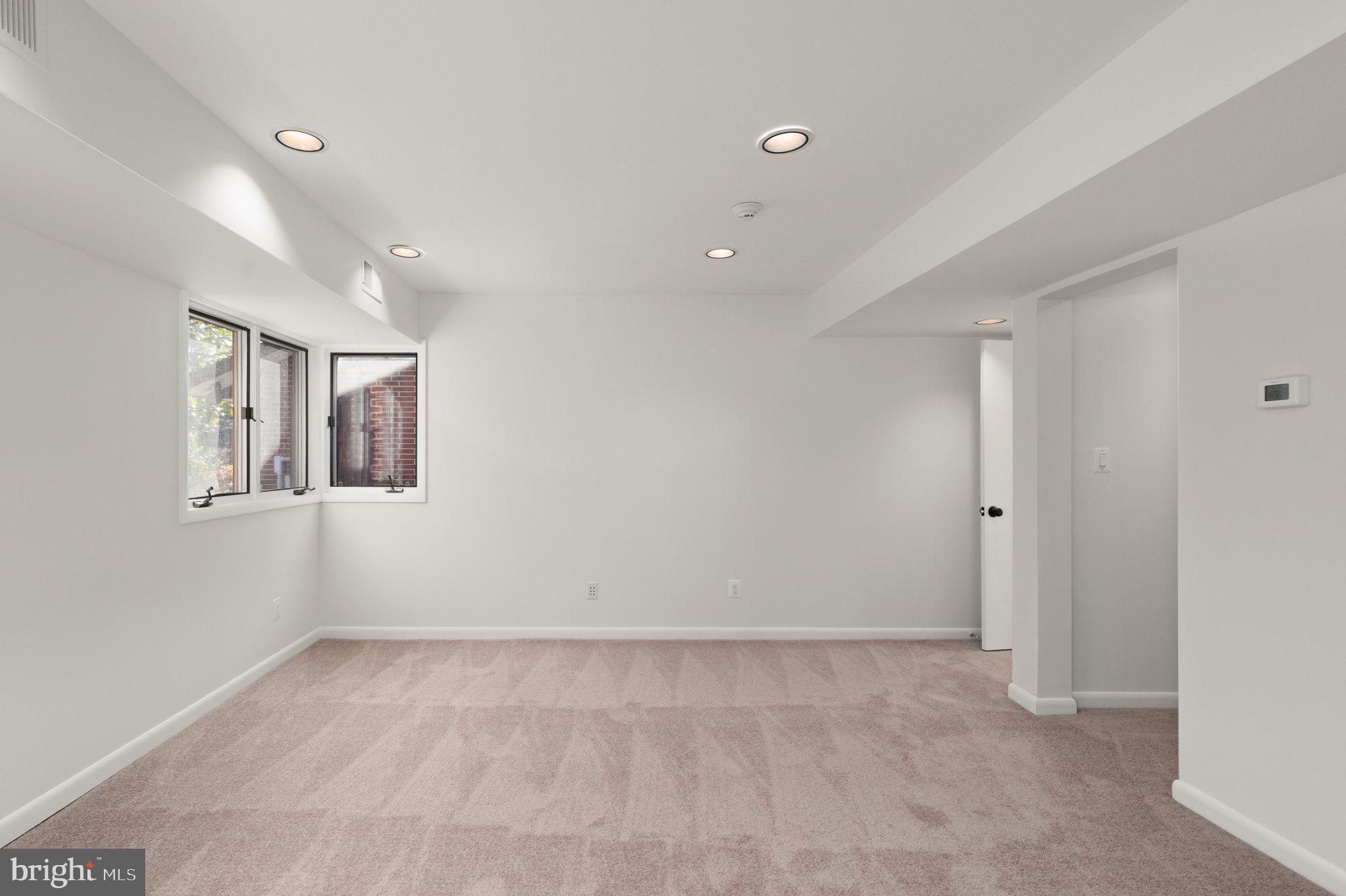 10810 Baronet Road Owings Mills, MD 21117 - Photo 43 of 83 a view of an empty room with a window