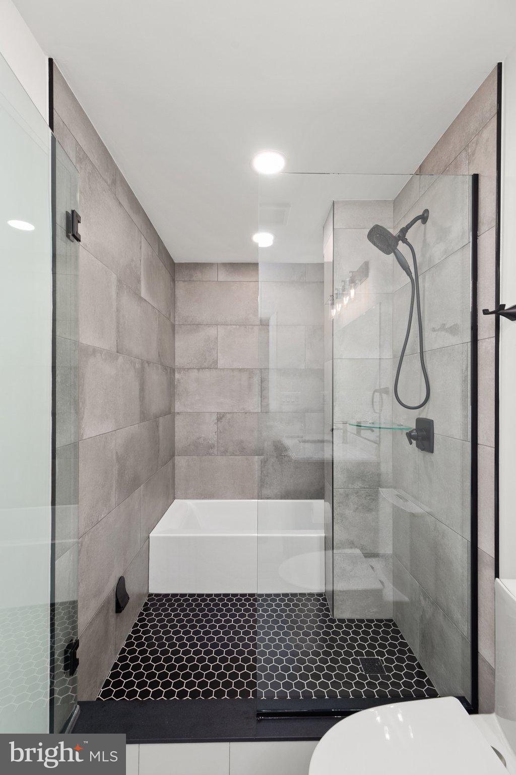 10810 Baronet Road Owings Mills, MD 21117 - Photo 47 of 83 a bathroom with a toilet and a shower