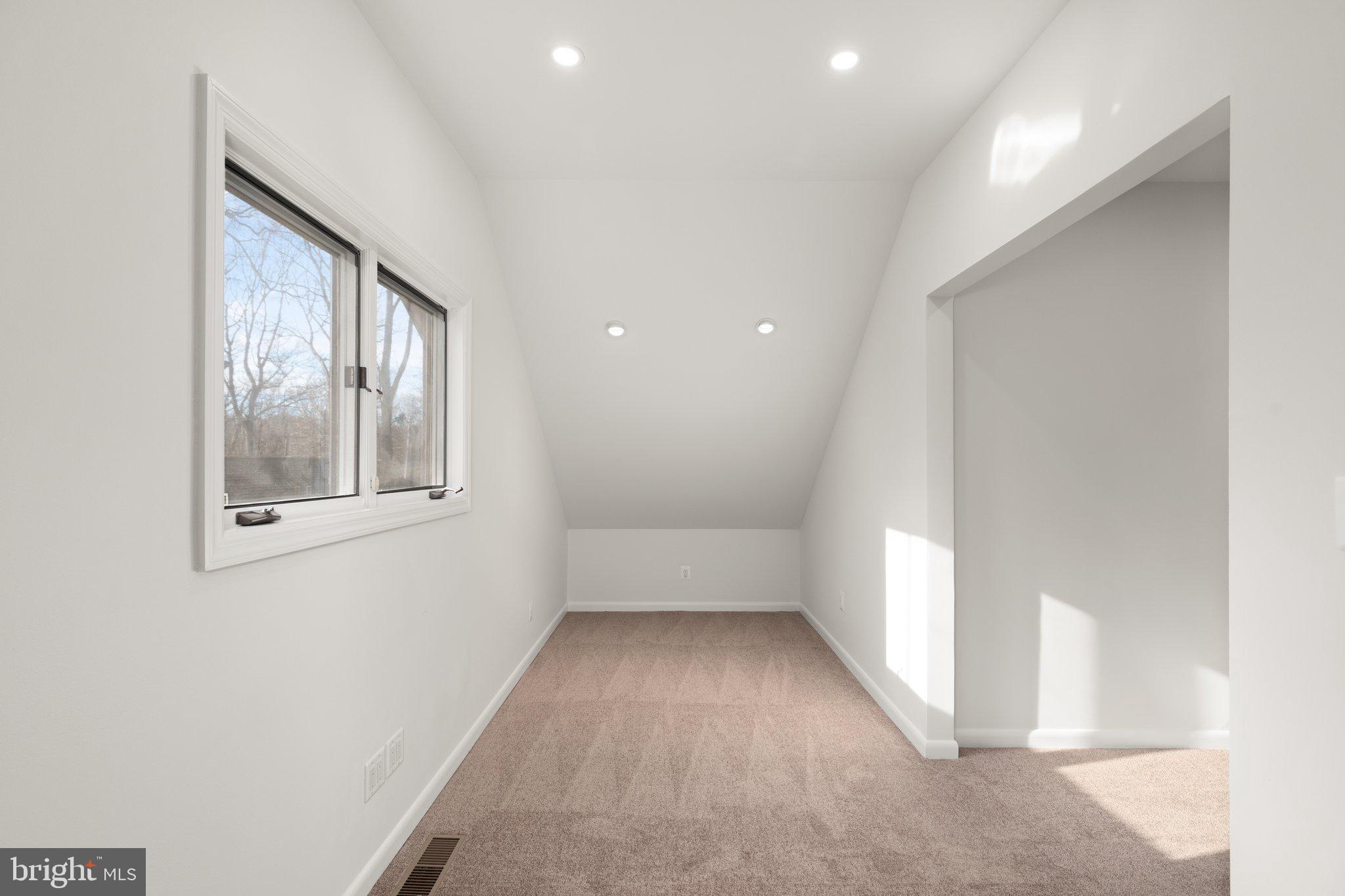 10810 Baronet Road Owings Mills, MD 21117 - Photo 49 of 83 an empty room with windows