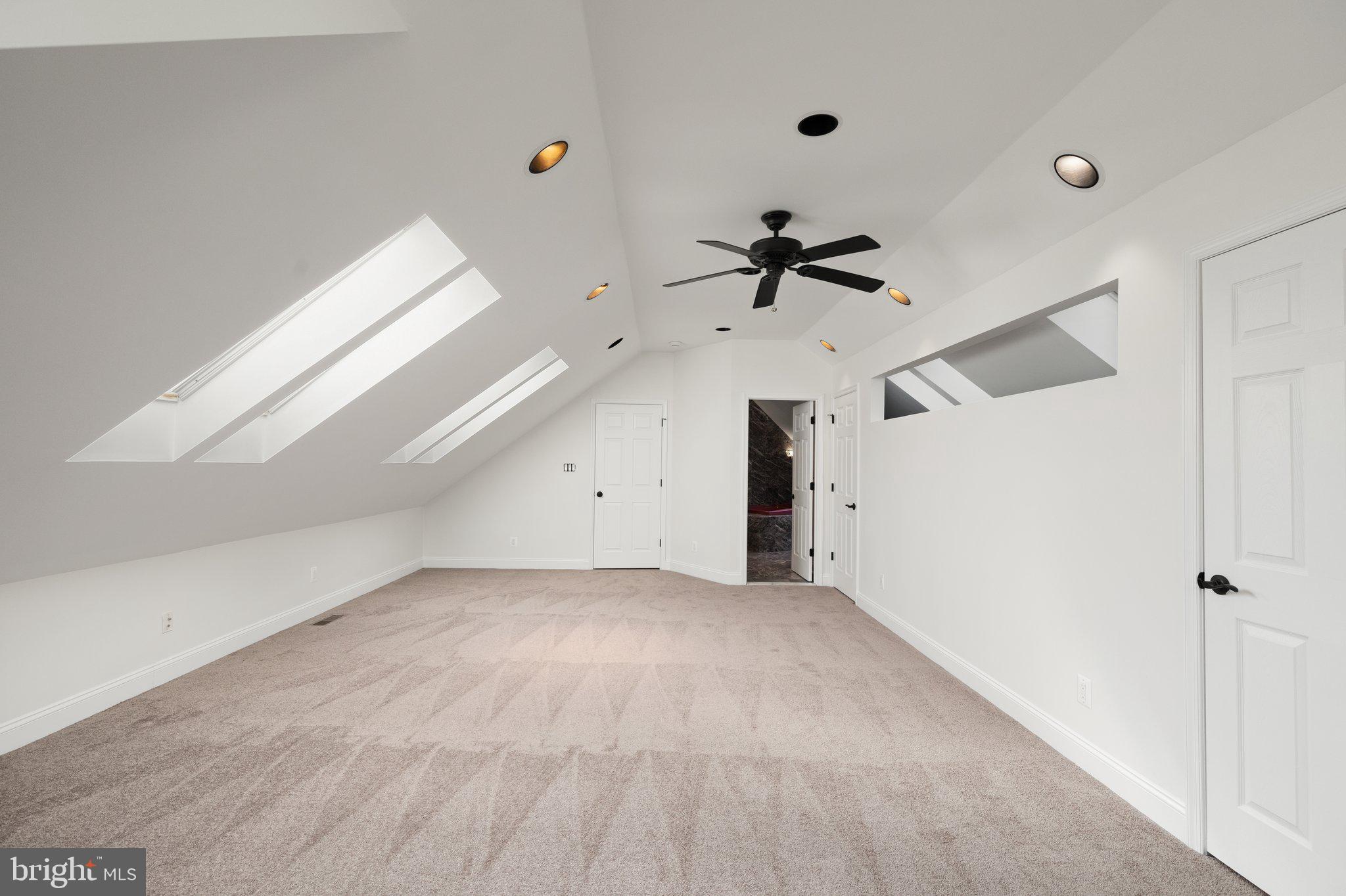 10810 Baronet Road Owings Mills, MD 21117 - Photo 54 of 83 a view of a room with a ceiling fan