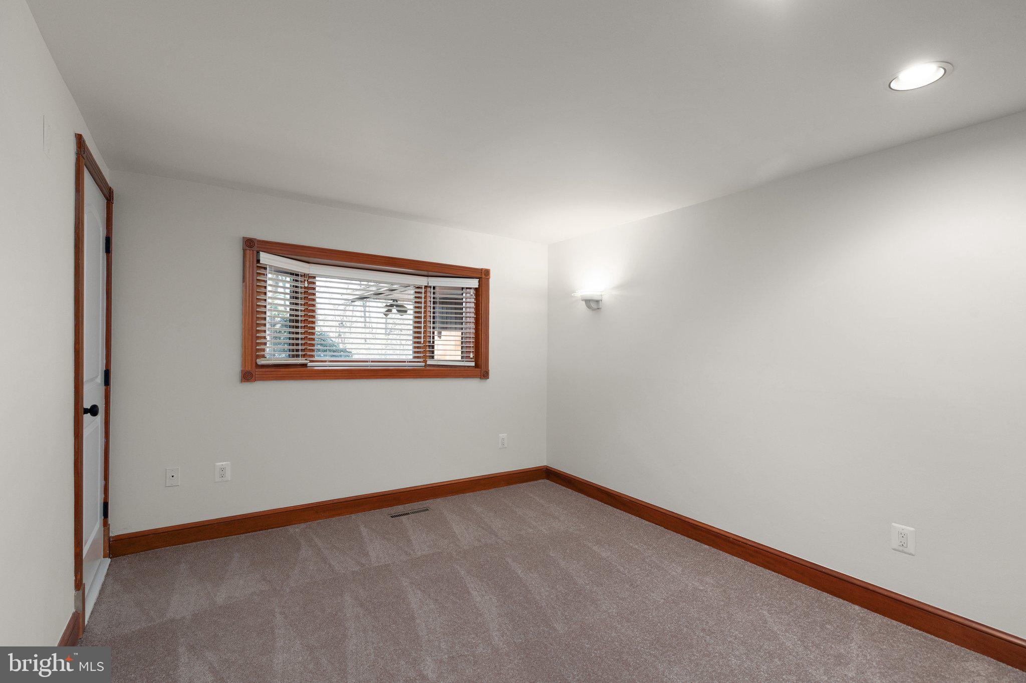 10810 Baronet Road Owings Mills, MD 21117 - Photo 60 of 83 a view of an empty room with a window