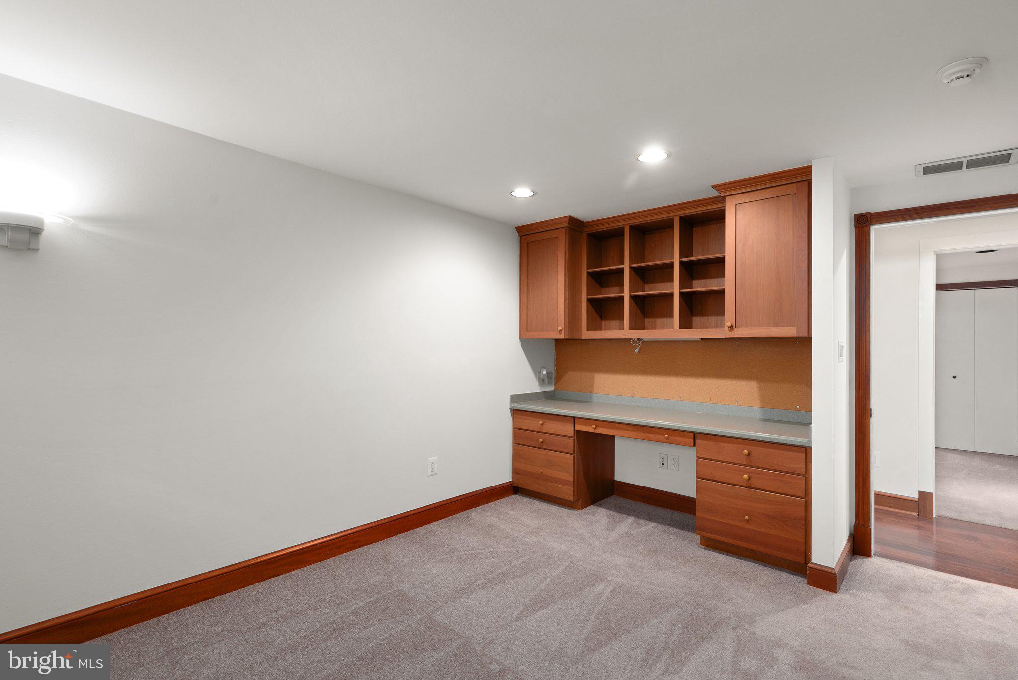 10810 Baronet Road Owings Mills, MD 21117 - Photo 61 of 83 a view of an empty room with kitchen and window