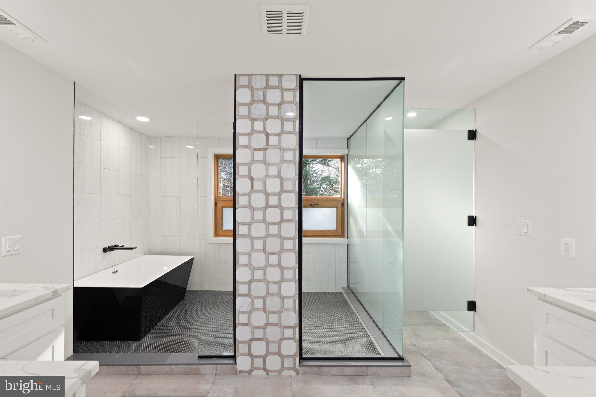 10810 Baronet Road Owings Mills, MD 21117 - Photo 71 of 83 a bathroom with a glass door shower