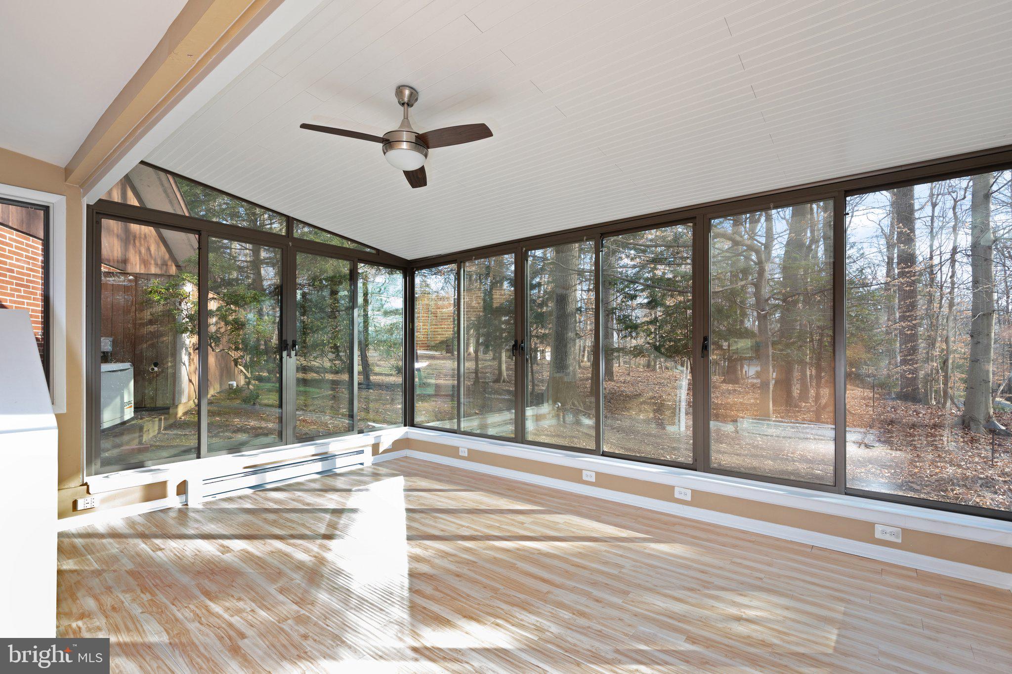 10810 Baronet Road Owings Mills, MD 21117 - Photo 73 of 83 a view of a porch with a floor to ceiling window
