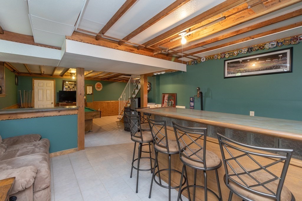 46 Radisson Lane Westfield, MA 01085 - Photo 33 of 40 a kitchen with a table and chairs in it