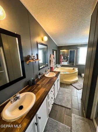 a bathroom with a toilet and a mirror