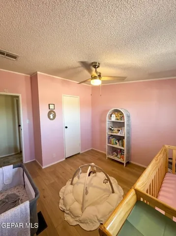 a room with furniture and a wooden floor