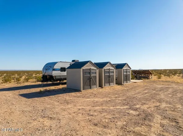 a view of a balcony with chairs