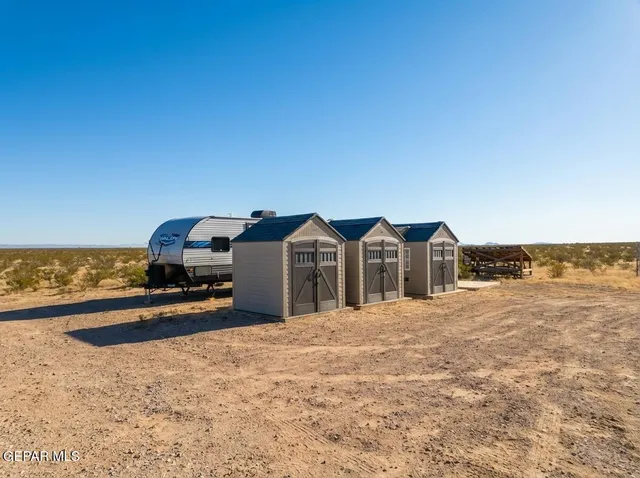 a view of a balcony with chairs