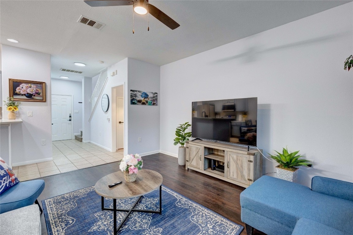 7510 Lazy Creek Drive, Unit B Austin, TX 78724 - Photo 11 of 36 a living room with furniture and a flat screen tv