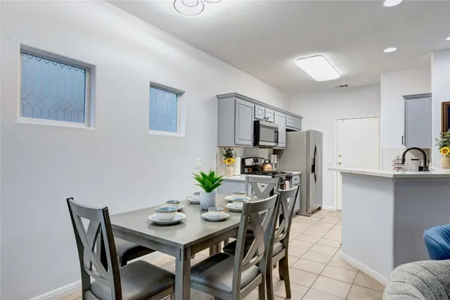 a view of a dining room with furniture