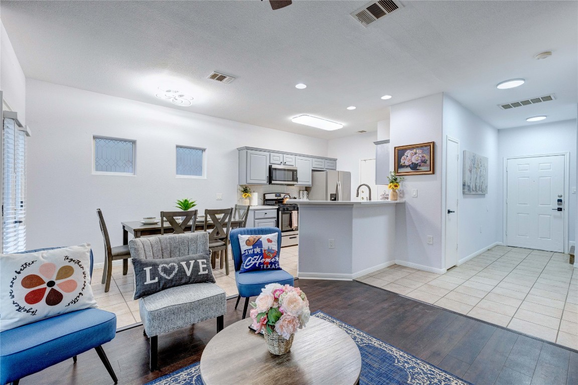 7510 Lazy Creek Drive, Unit B Austin, TX 78724 - Photo 15 of 36 a living room with furniture and wooden floor