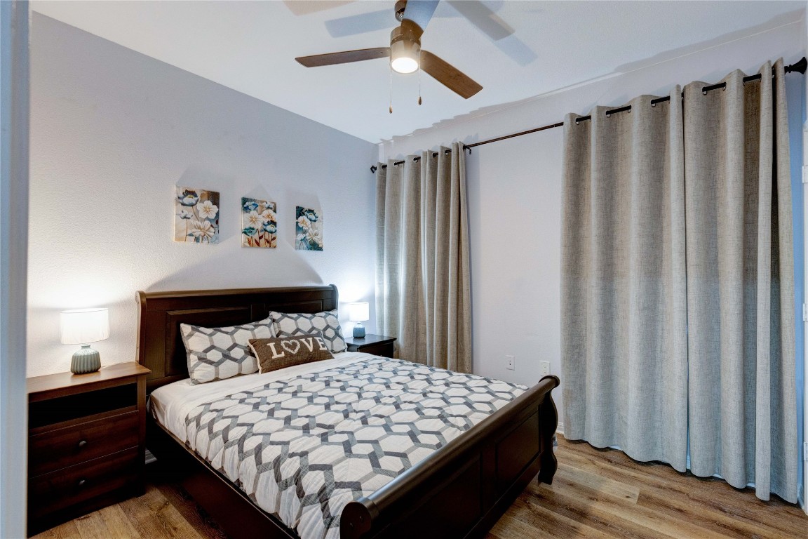 7510 Lazy Creek Drive, Unit B Austin, TX 78724 - Photo 19 of 36 a bedroom with a bed and a window