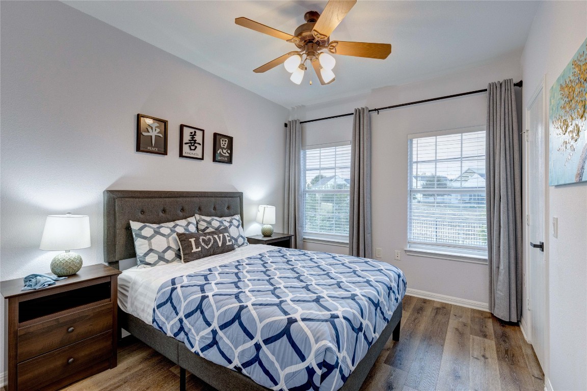 7510 Lazy Creek Drive, Unit B Austin, TX 78724 - Photo 20 of 36 a bedroom with a large bed and a window