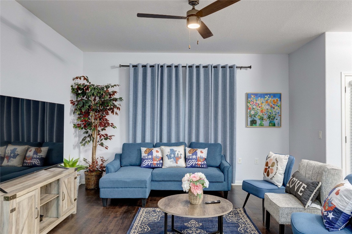 7510 Lazy Creek Drive, Unit B Austin, TX 78724 - Photo 30 of 36 a living room with furniture and a potted plant